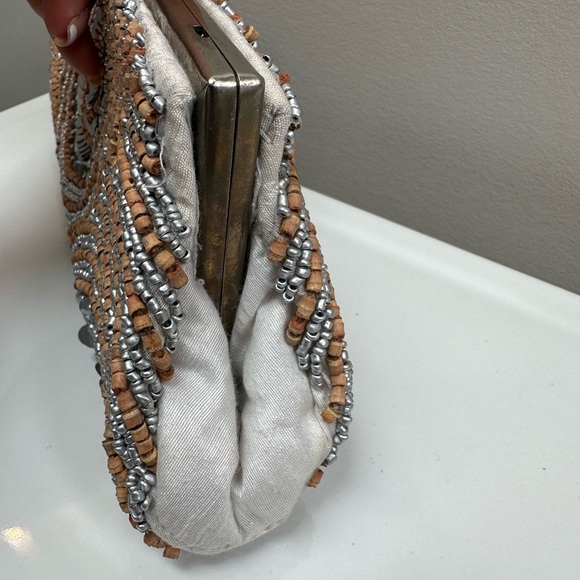 Beautiful WHITE HOUSE BLACK MARKET clutch with silver and neutral beading detail - Picture 6 of 6